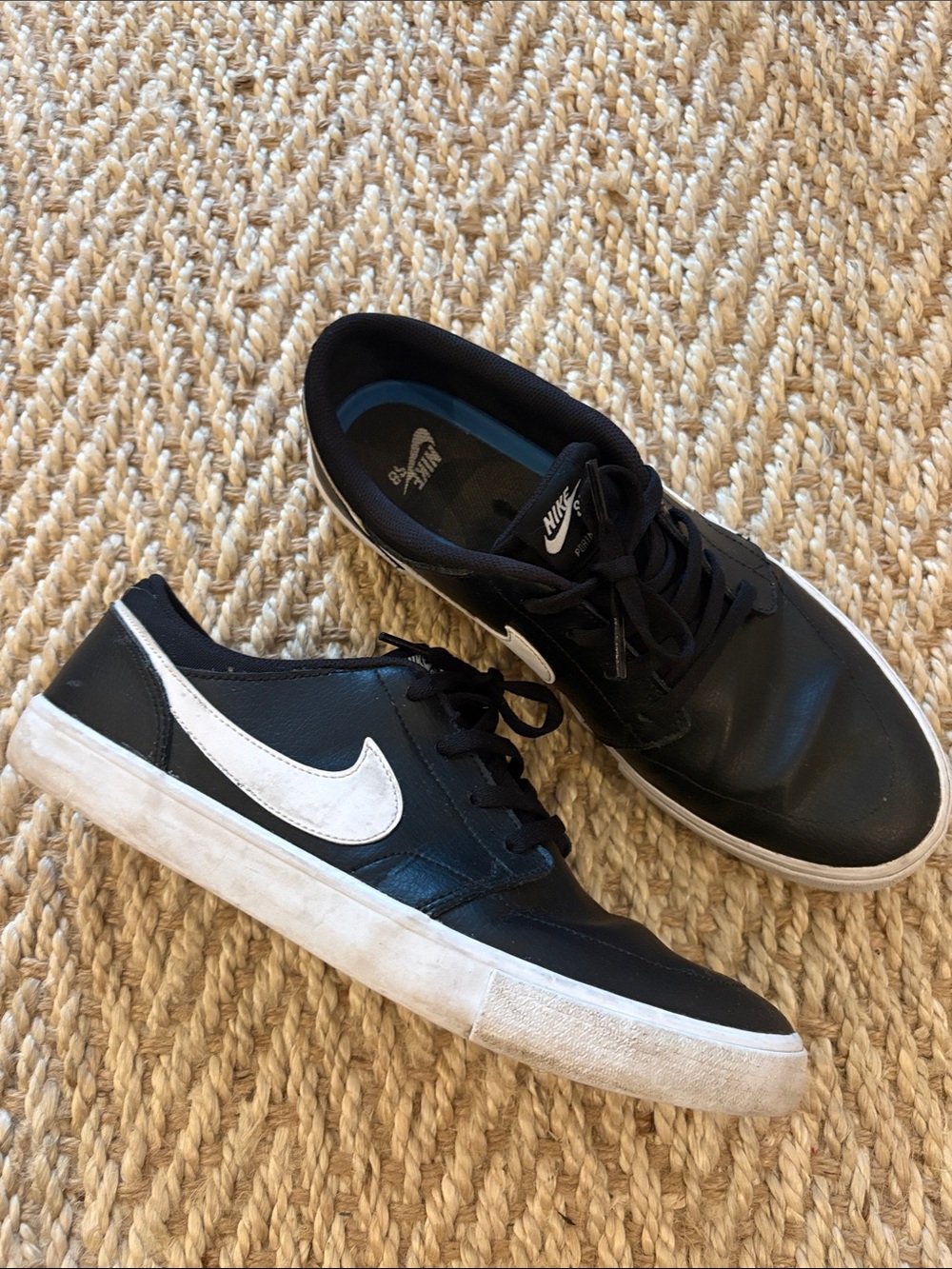 Nike Men’s Black Sneakers with White Swoosh
Nike SB Portmore